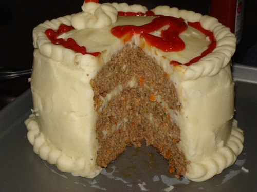 Meat Cake Meatloaf with potatoes and ketchup for icing. (via pongalong)